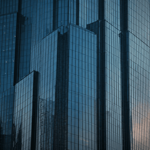 Modern corporate skyscraper facade with reflective glass windows